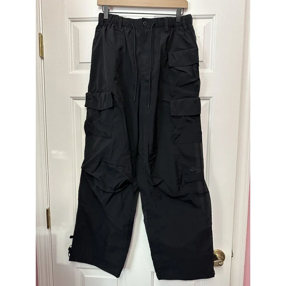 Size M Nike Mens Repel Tech Pack Lined Loose Taper Fit Pant Black FQ3868-010 NEW
